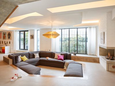 contempory living room with bespoke brass chandelier